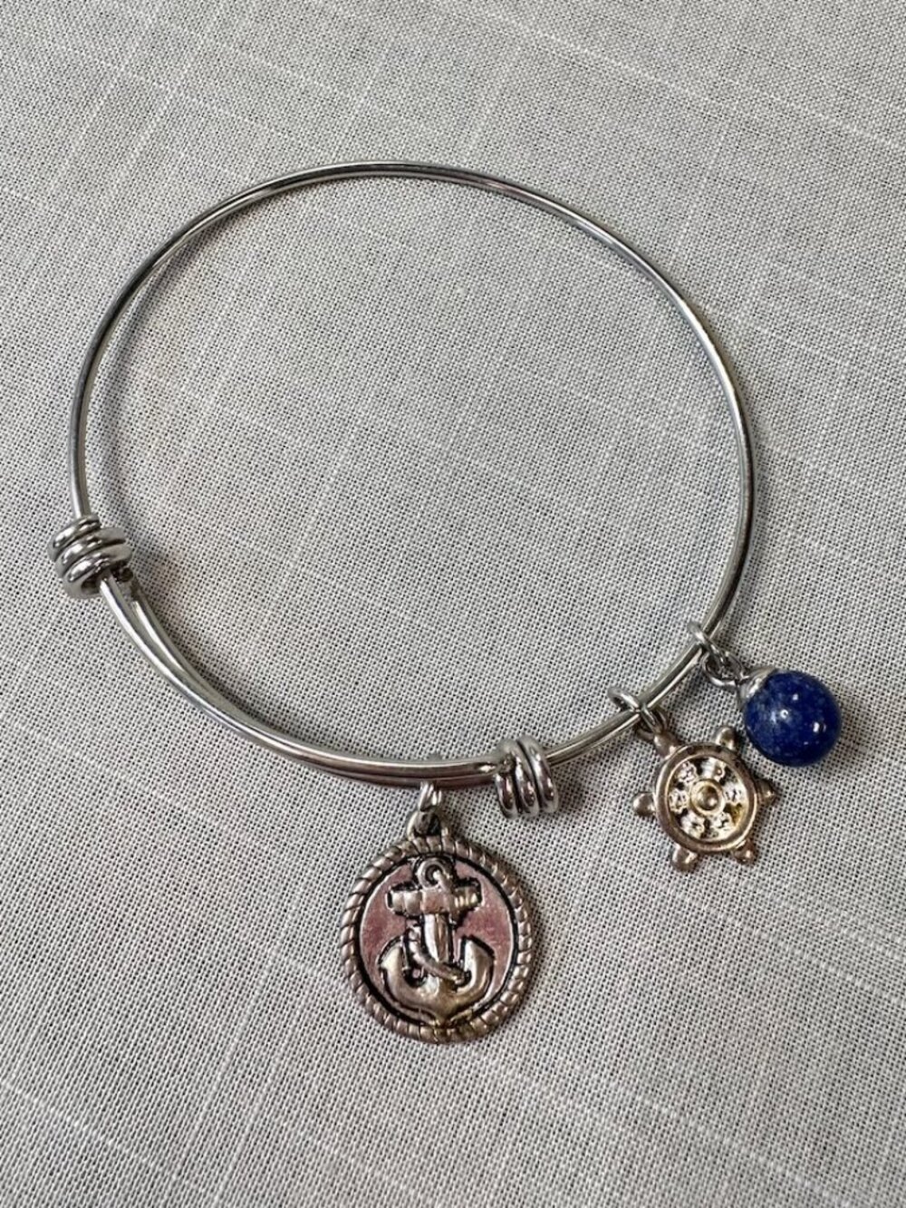 Expandable Silver Tone "Strength" Nautical Charm Bracelet